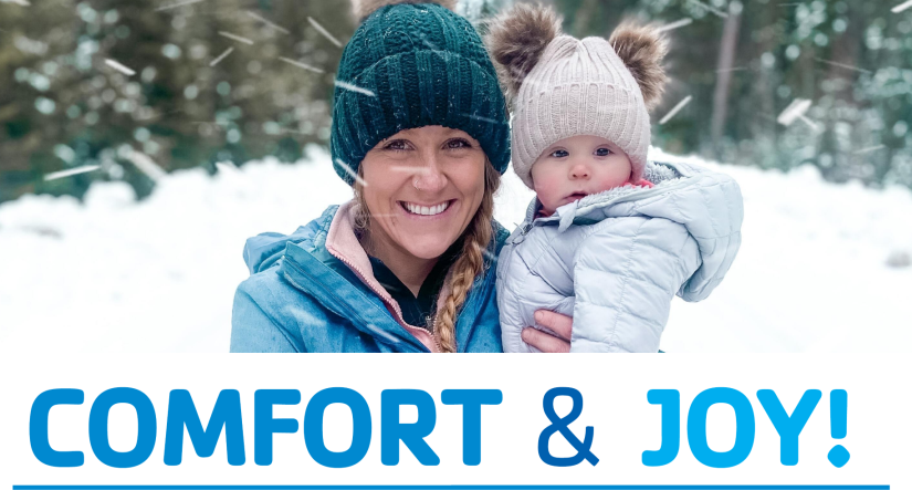 Mother and daughter in winter clothes, text: Comfort & Joy!