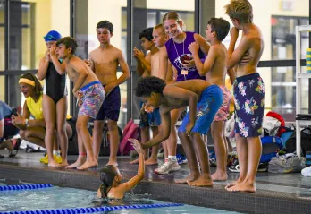 Children learning swim safety
