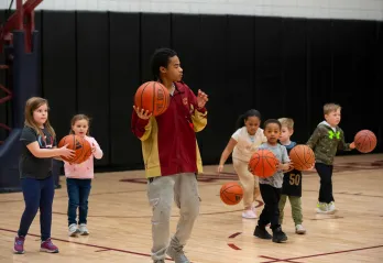 Children playing basketball at Healthy Kids Day