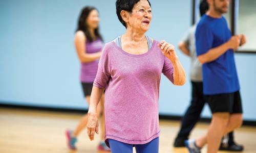 Active older adult in a exercise class
