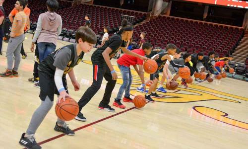 Jr Cavs practicing basketball at healthy kids day