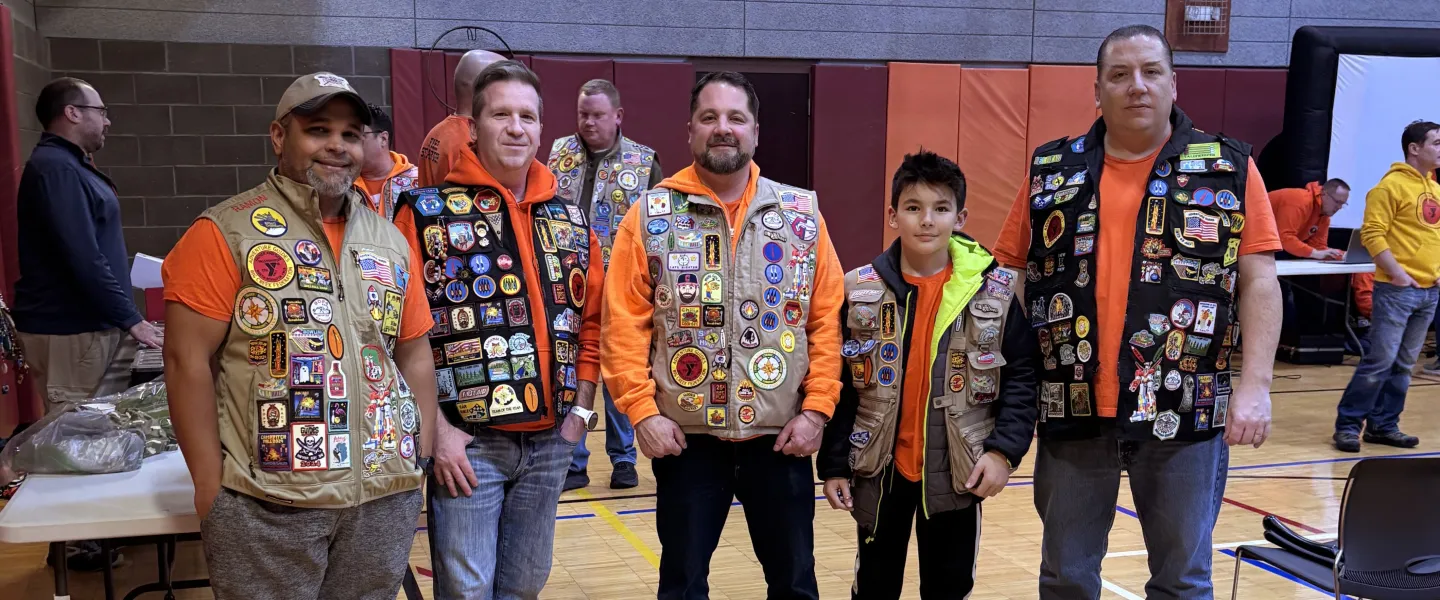 Adventure Guides members wearing vests