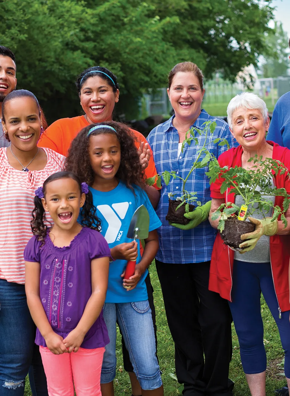 group of volunteers outside, all ages