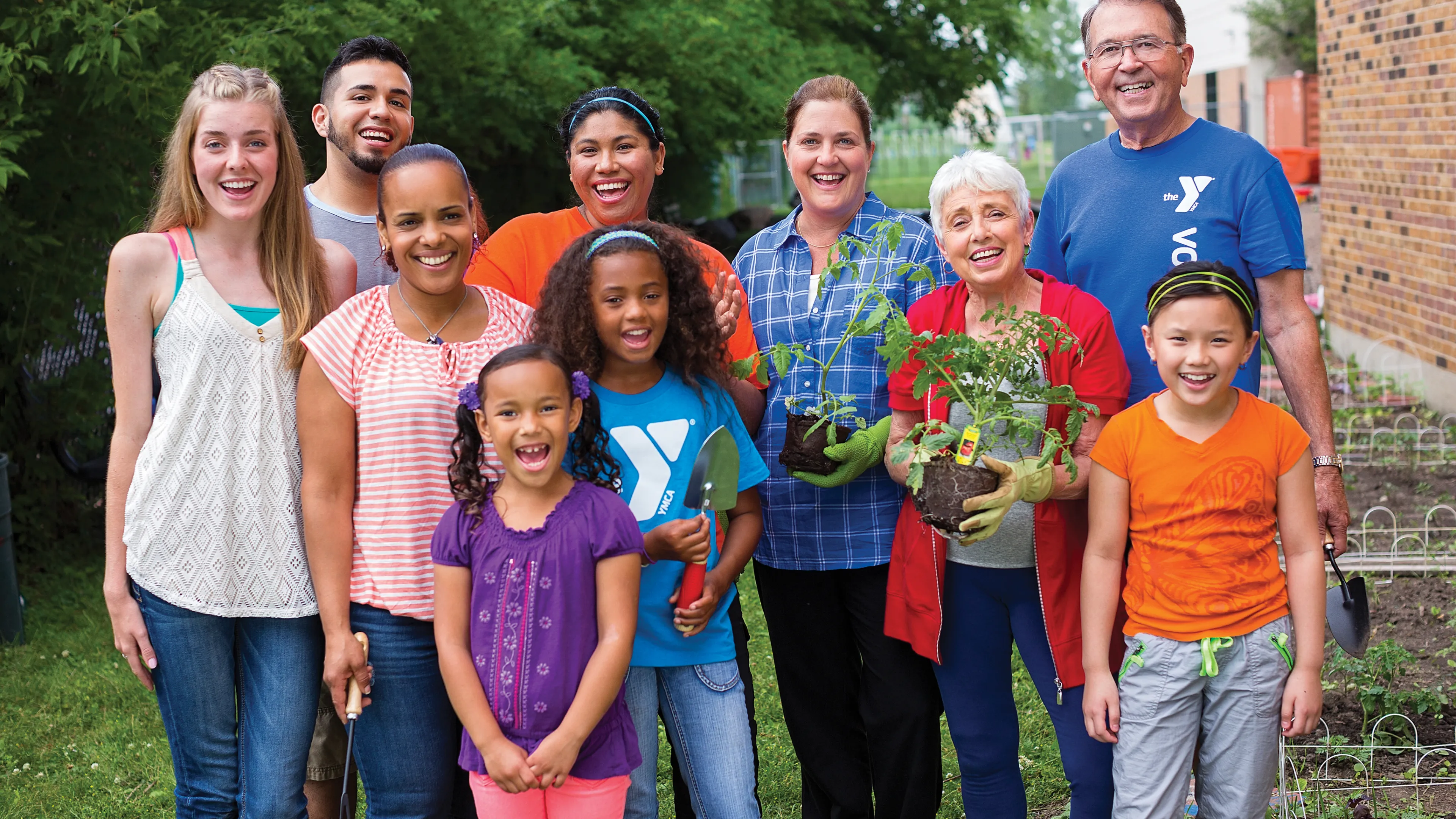 group of volunteers outside, all ages