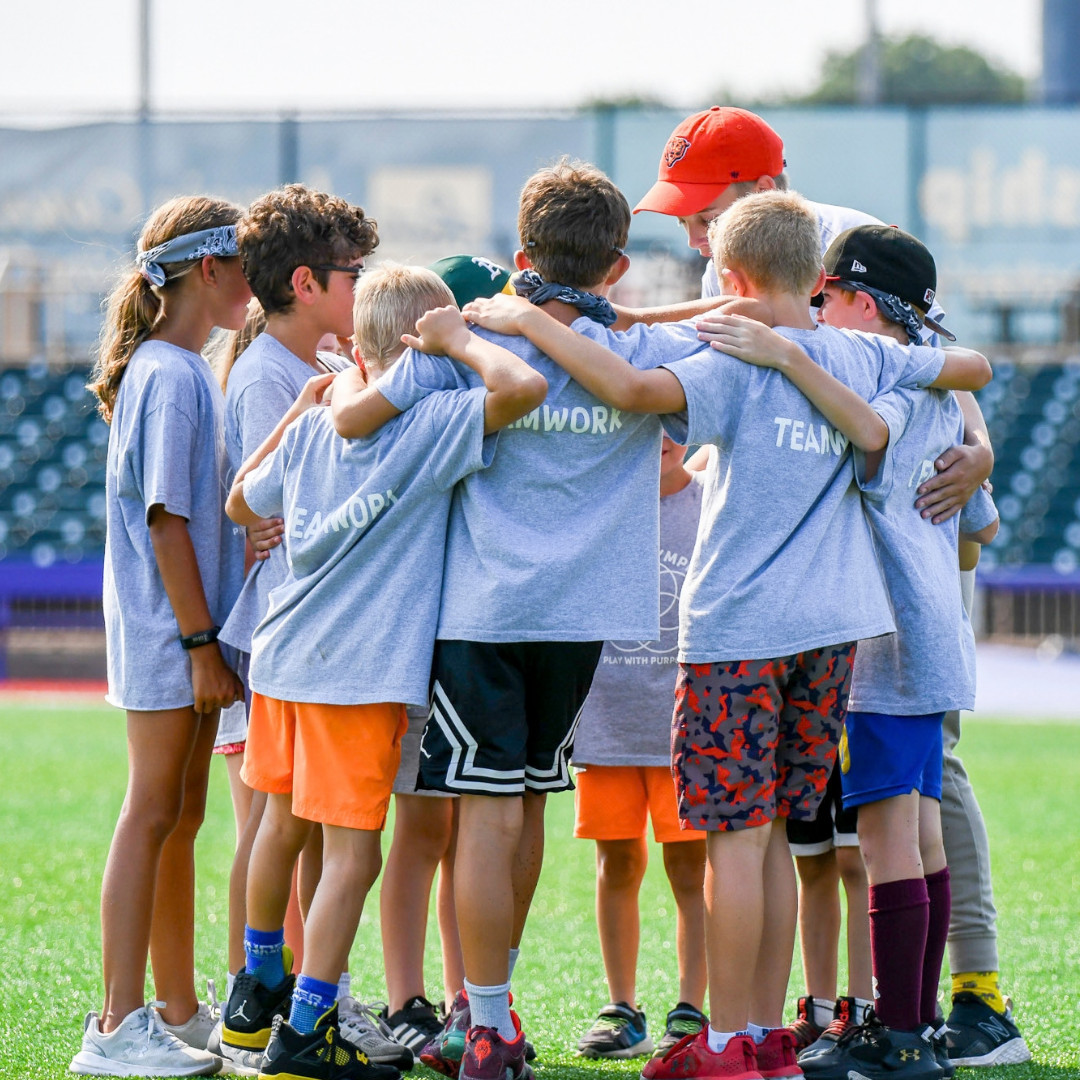 campers in a huddle