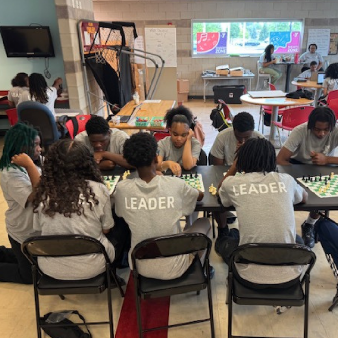 teen leader program teens playing chess