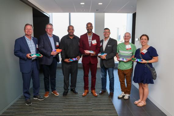 Community Impact Award Recipients (left to right), Walter F. Senney, Kurt Weber, Al Moon, Corey Burke, Jason Salupo, Jon and Jamie Galiardi