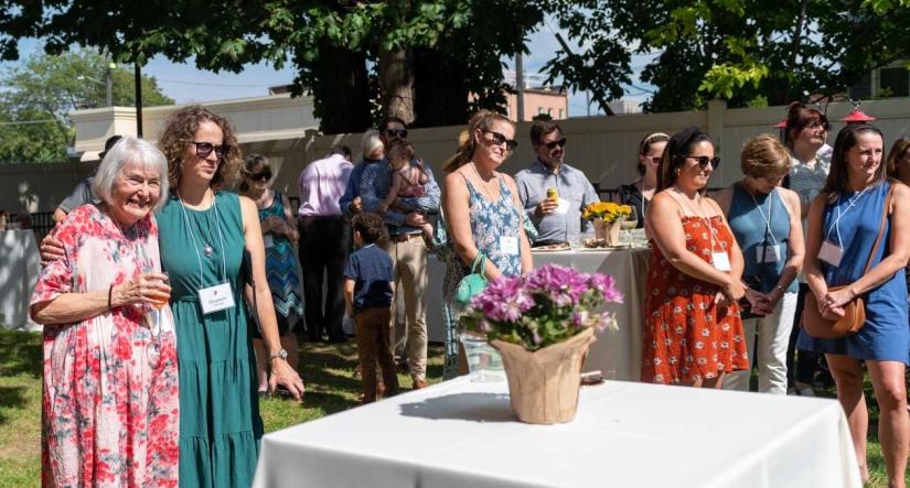 Members gathering for opening of Susan's Garden