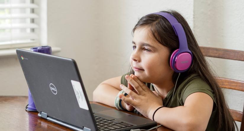 young girl on the computer