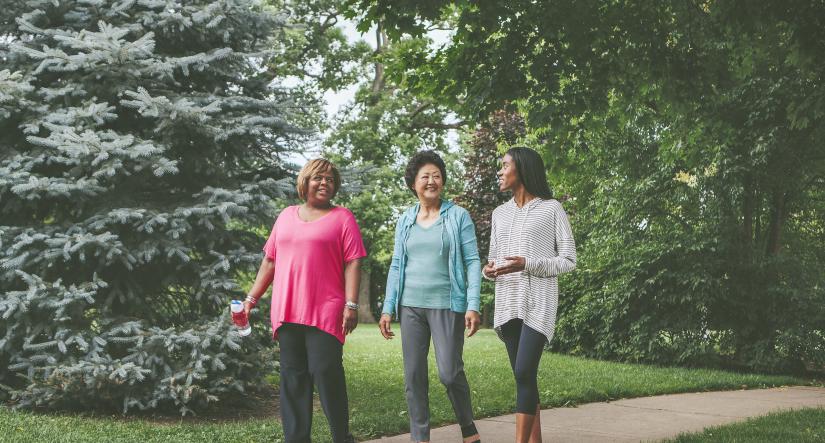 Three women walking outside