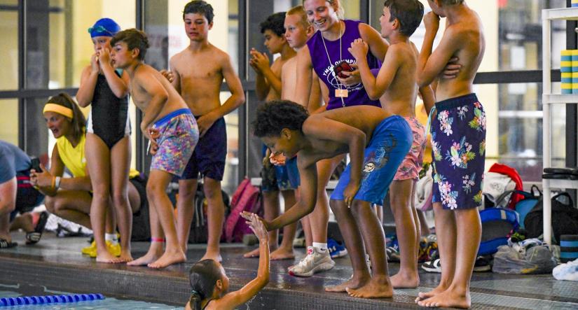 Children learning swim safety