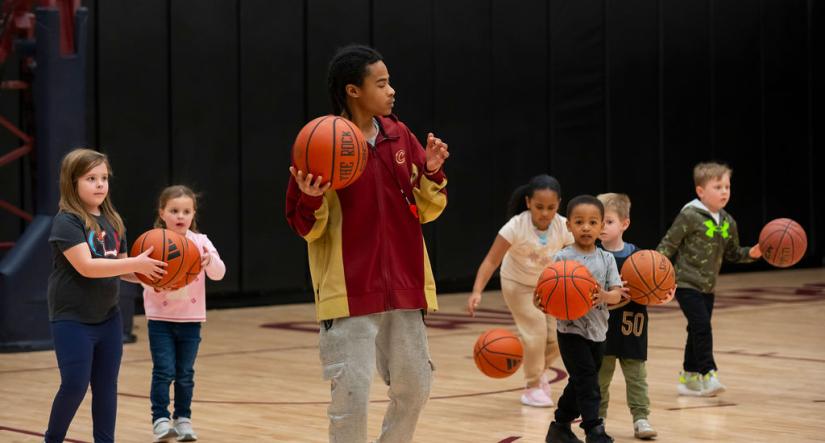 Children playing basketball at Healthy Kids Day