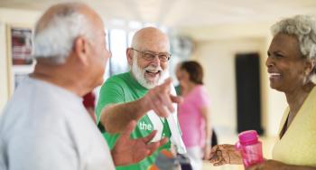 people having fun in a Y exercise class