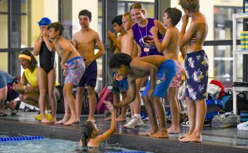 Children learning swim safety