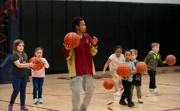 Children playing basketball at Healthy Kids Day